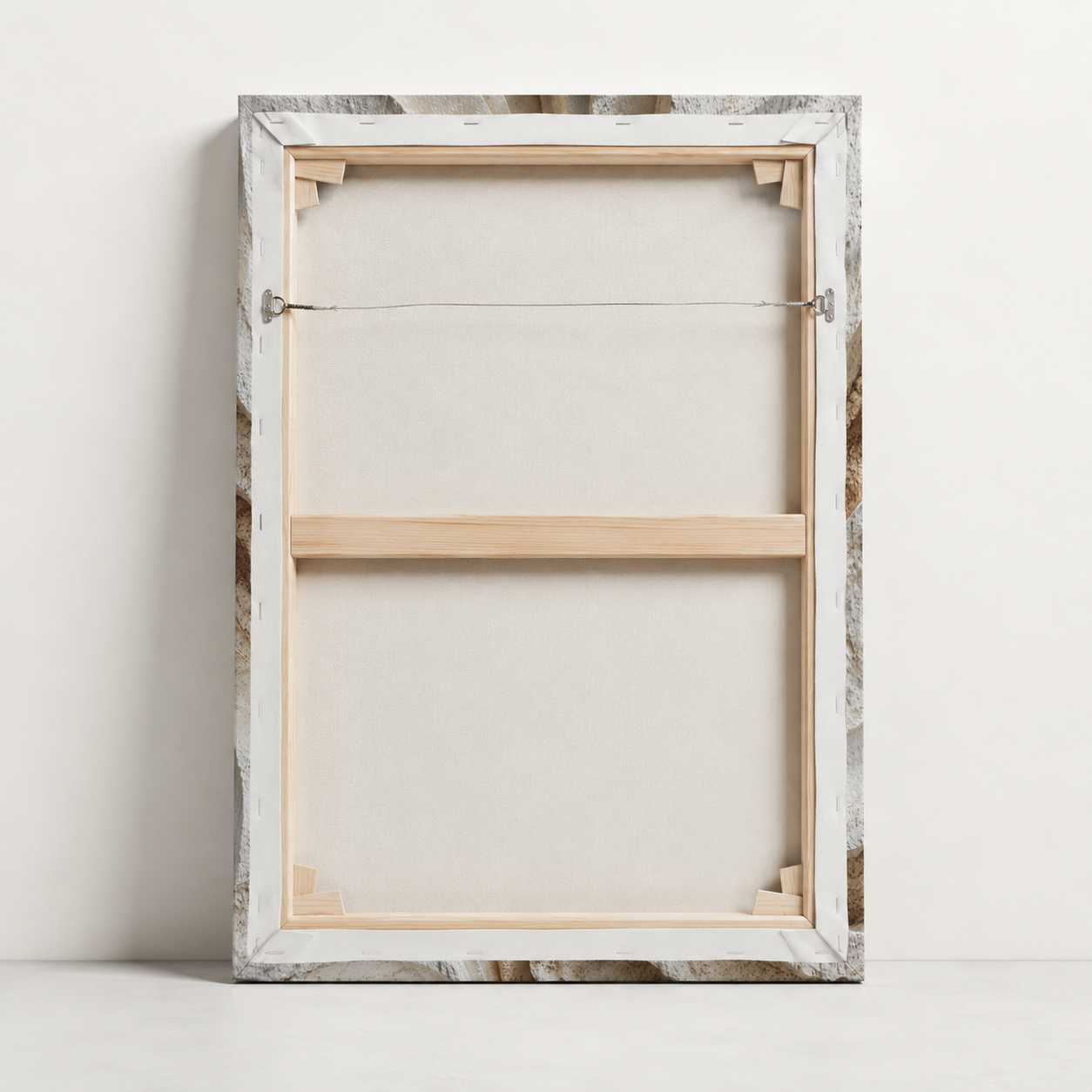 Back view of Monolith stretched canvas showing wooden stretcher frame, wrapped canvas edges and hanging hardware