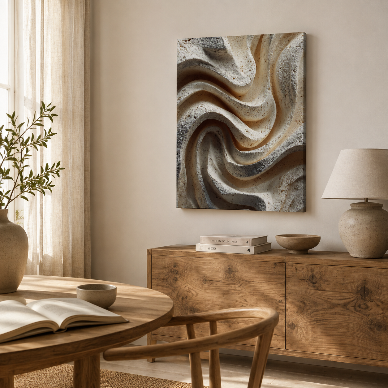 Ripple textured canvas wall art displayed in a warm neutral dining and reading space with natural wood furniture